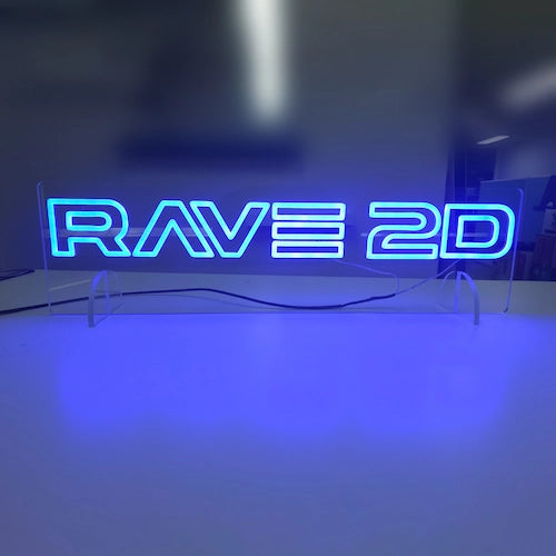 RAVE 2Dロゴのネオン看板。アクリル製の立て台を使用し自立させているスタンド1タイプ。カラーはBlueで製作。